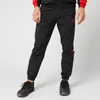 Puma Men's XTG Woven Pants - Puma Black/Red Combo - Image 1